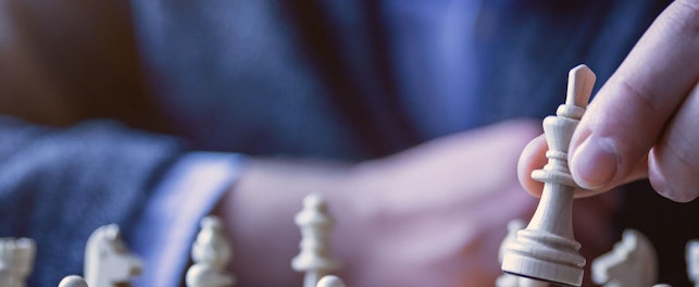 Person Playing Chess